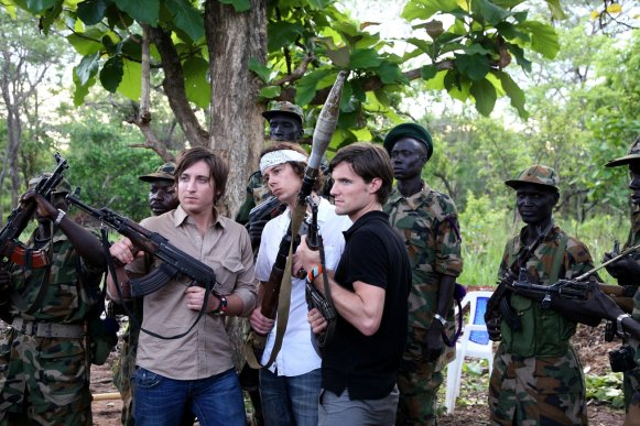 invisible_children_holding_weapons_in_uganda