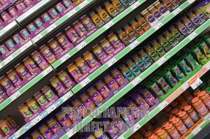 Curry pastes and sauces on a supermarket shelf