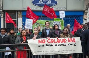 Protesters with leaflets 'No Colour Bar' against illegal colour bar operated by two Willesden letting agencies
