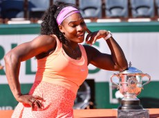 PARIS, FRANCE - JUNE 6: Serena Williams of the United States poses with the Coupe Suzanne Lenglen trophy after winning the Women's Singles Final against Lucie Safarova of Czech Repubulic at the French Open tennis tournament, Roland Garros in Paris, France on June 6, 2015. (Photo by Mustafa Yalcin/Anadolu Agency/Getty Images)